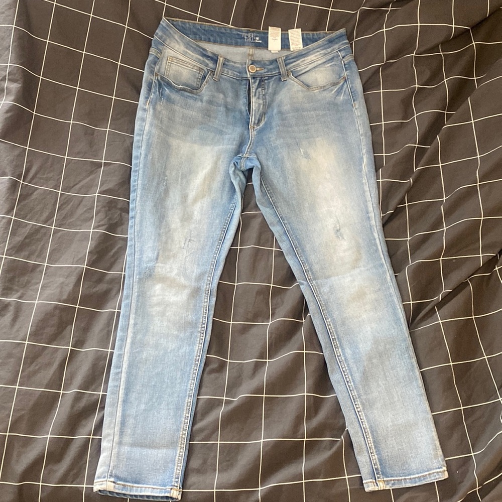 Light wash jeans.